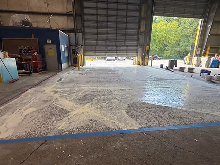 Finished residential concrete floor coating with decorative flake
