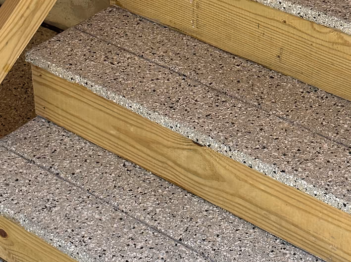 Decorative flake coating applied to garage steps
