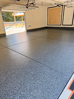 Finished gray concrete floor coating with smooth protective finish